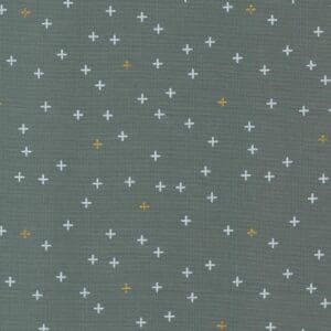 Gray fabric with small cross patterns.