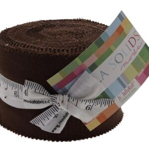 Brown fabric roll with measuring tape ribbon.