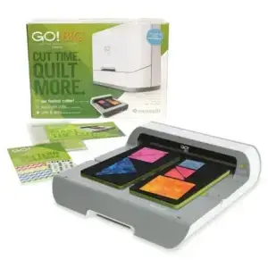 Fabric cutting machine with colorful quilt pieces
