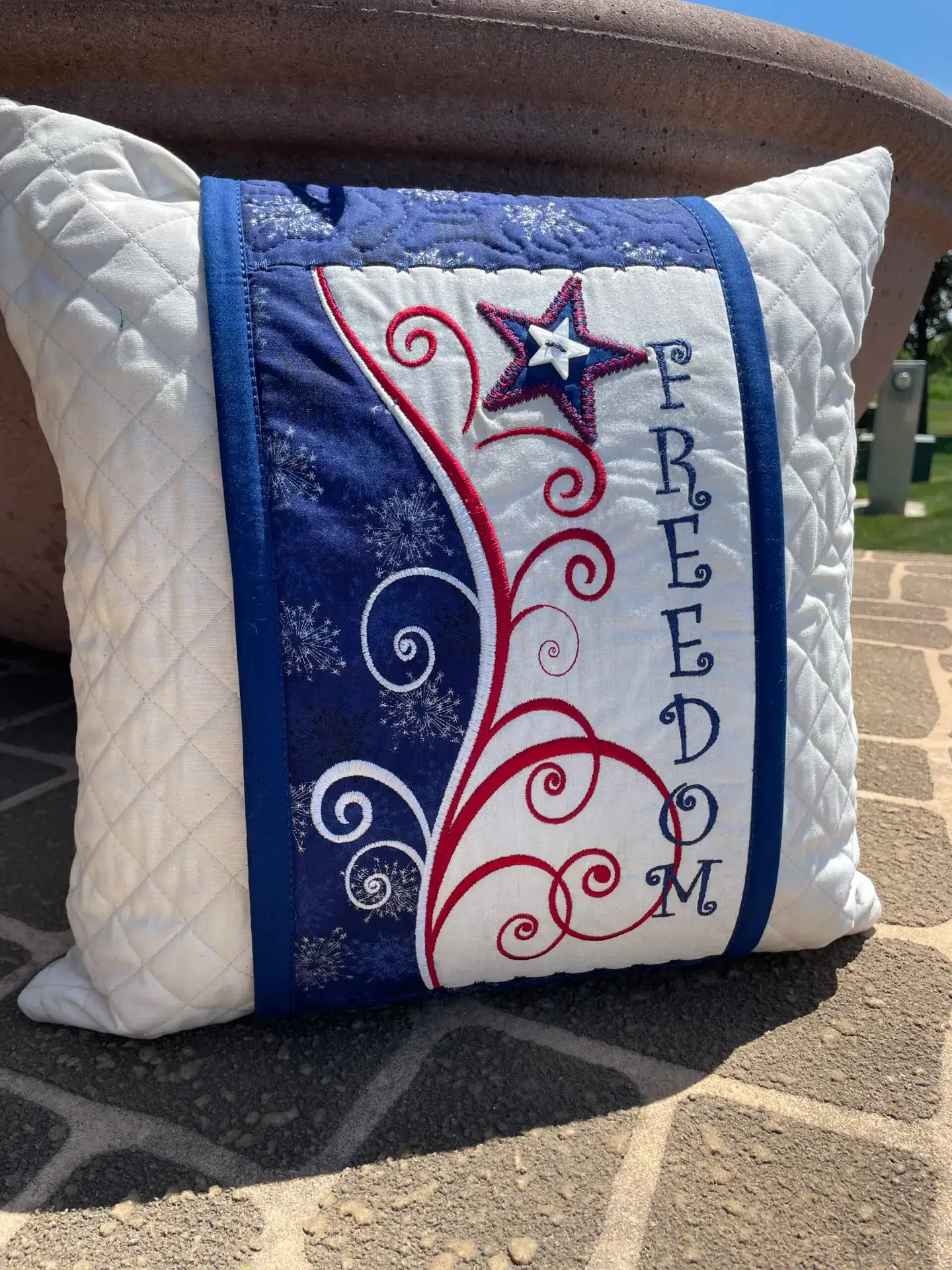 Quilted patriotic pillow embroidered with FREEDOM