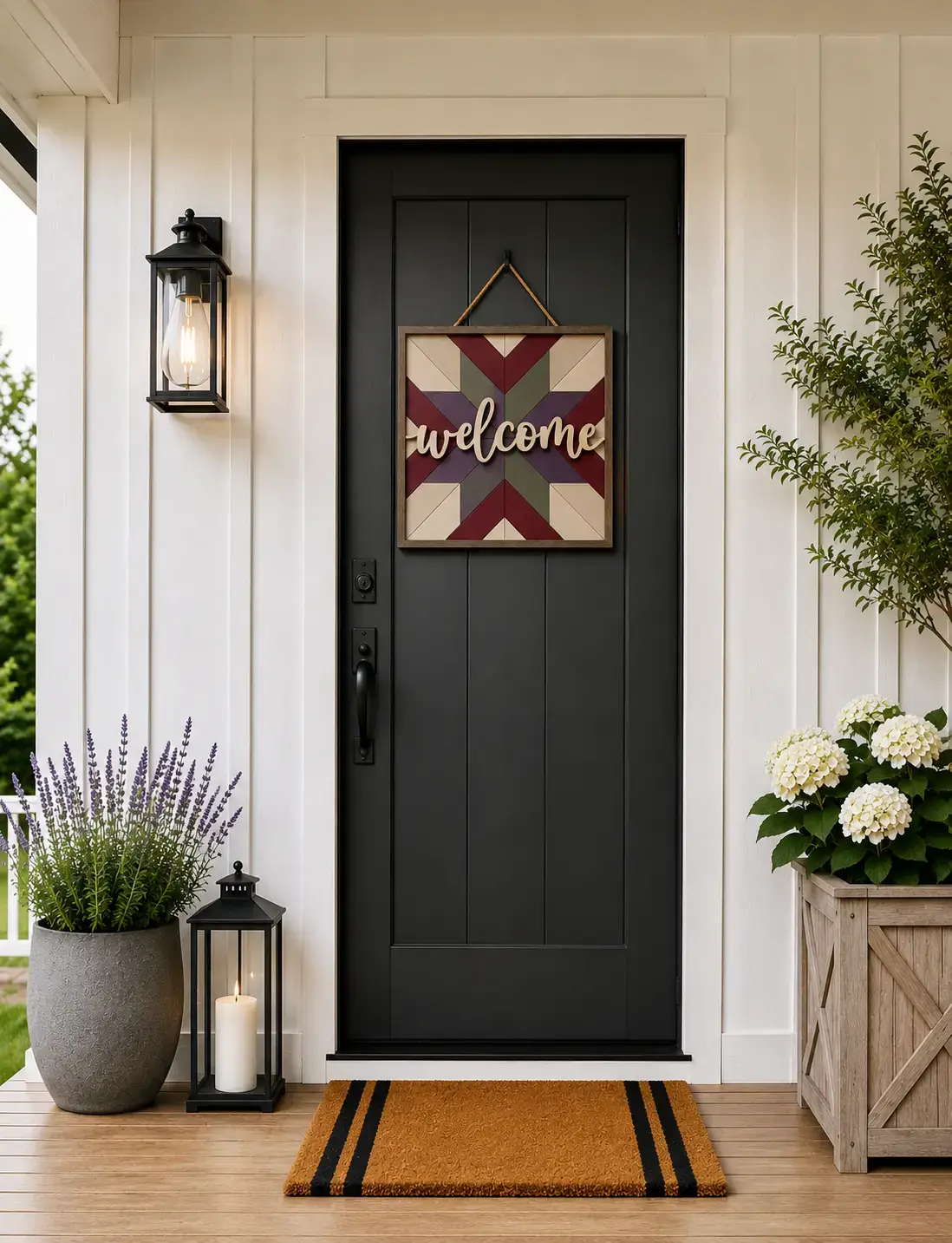 Black front door with welcome sign and plants